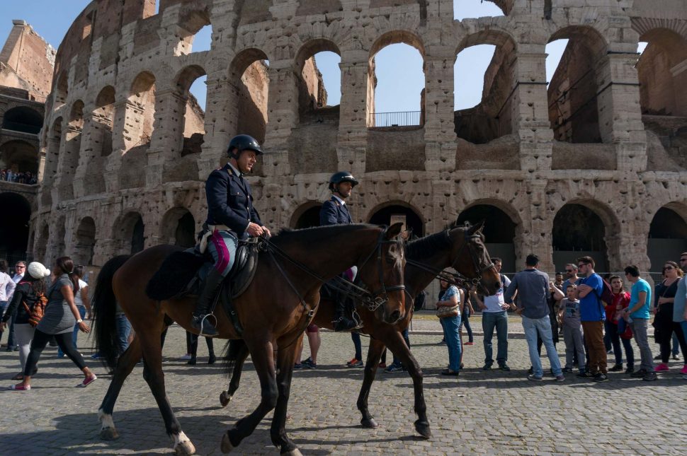 Italian military police, the Carabinieri, patrolling on horseback near the Colosseum